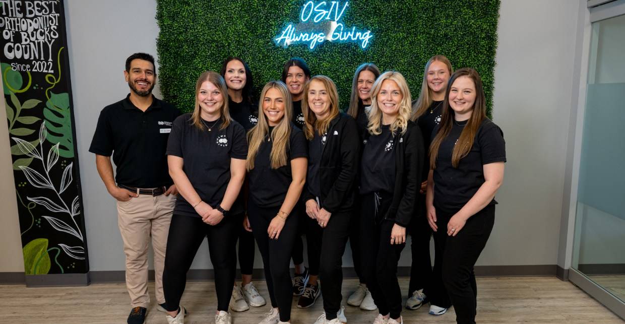 Orthodontic Specialists team members smiling together